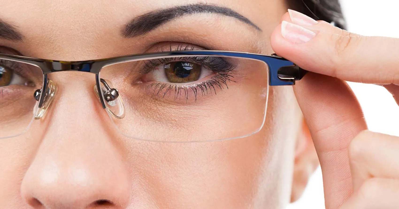 Woman adjusting new glasses